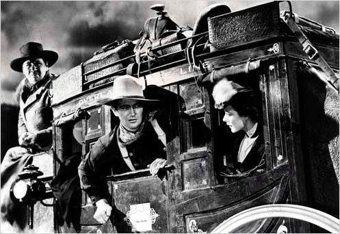 La Chevauchée fantastique : photo George Bancroft, John Ford, John Wayne, Louise Platt