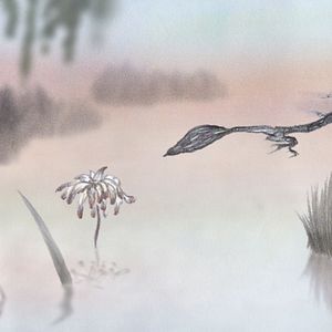 Photo Un oiseau qui aime une fleur