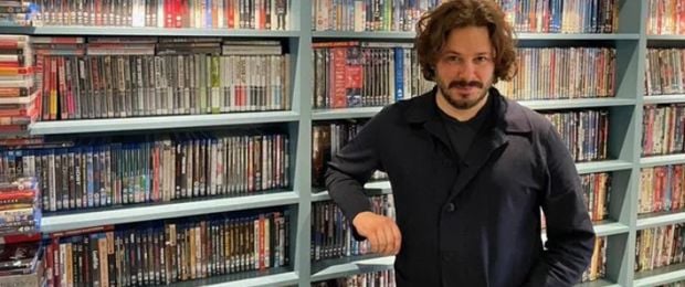 Edgar Wright poses in front of his vast film collection.