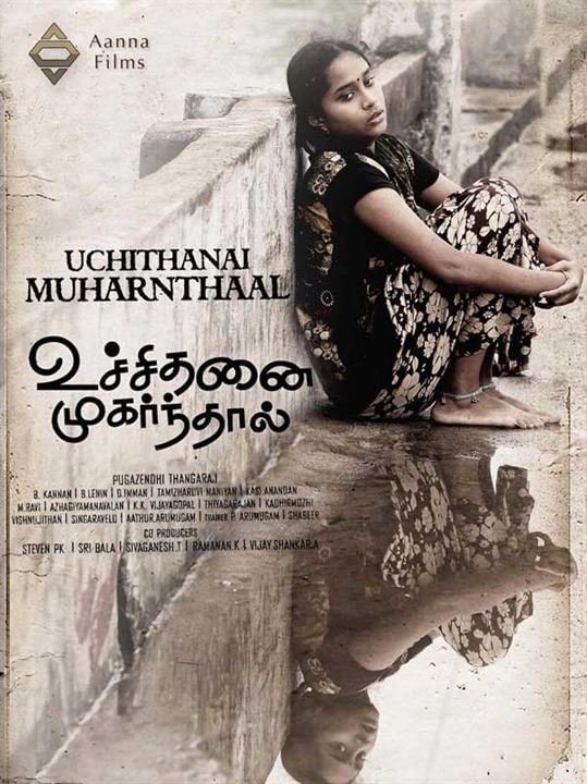 Uchithanai Muharnthaal : Affiche