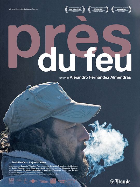 Près du feu : Affiche